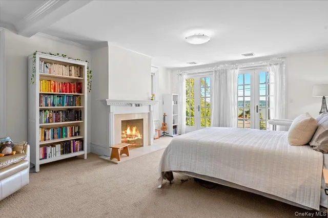 a bathroom with a bathtub sink and mirror