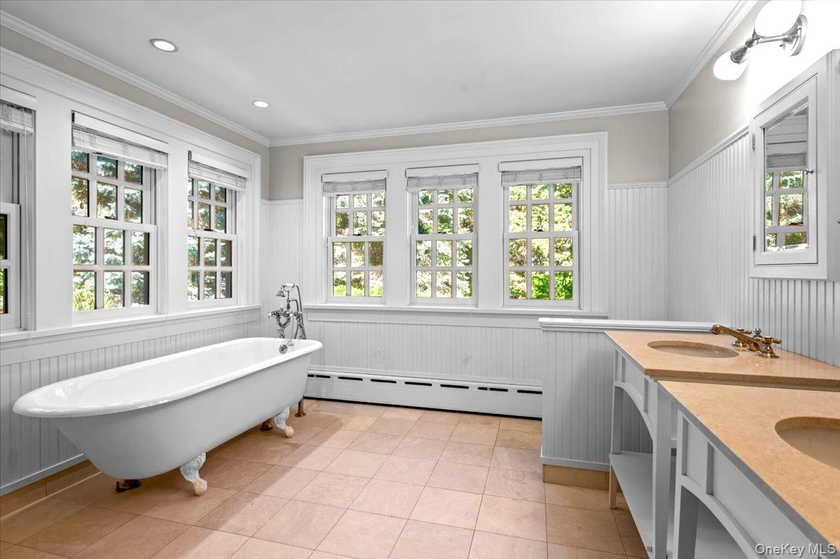 245 River Road Nyack, NY 10960 - Photo 39 of 45 a spacious bathroom with a tub sink and mirror
