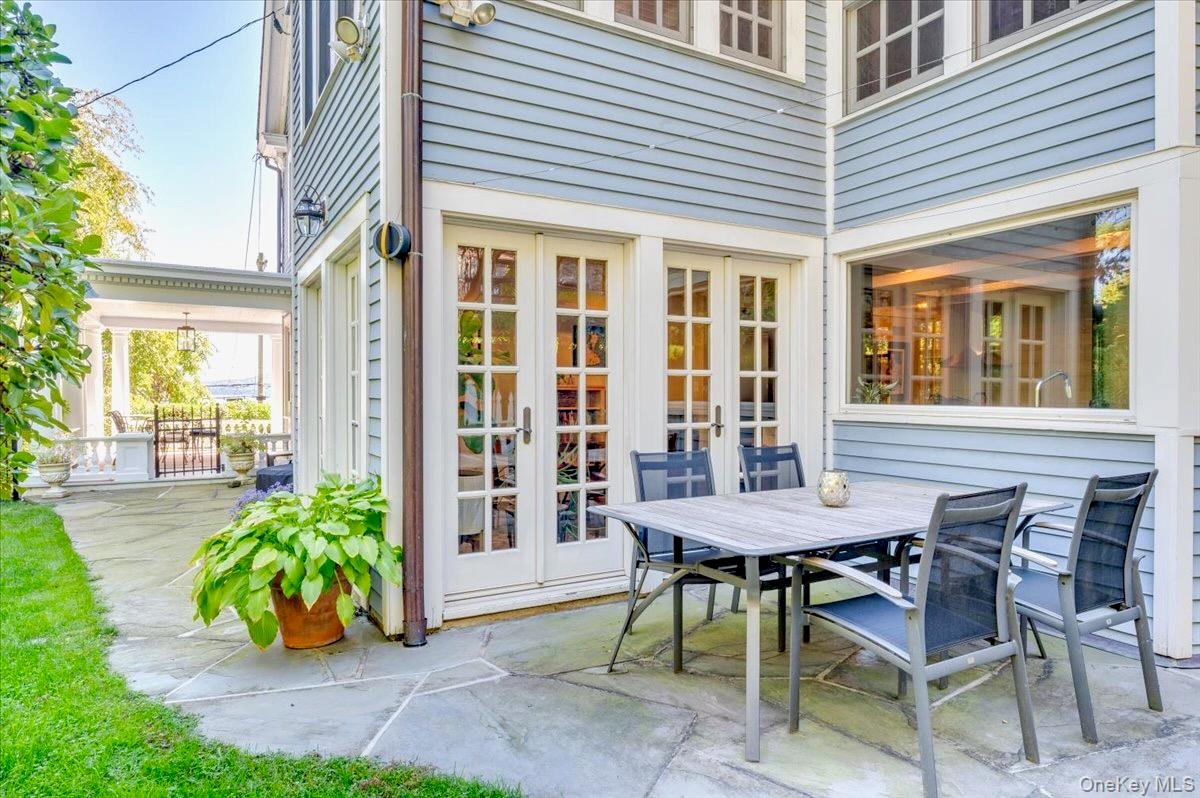 245 River Road Nyack, NY 10960 - Photo 42 of 45 a view of a house with a table and chair in the patio