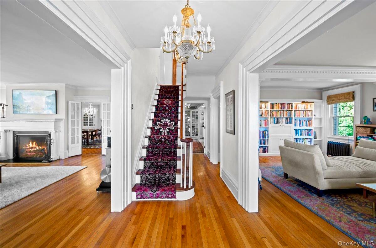 245 River Road Nyack, NY 10960 - Photo 5 of 45 a living room with furniture and a chandelier