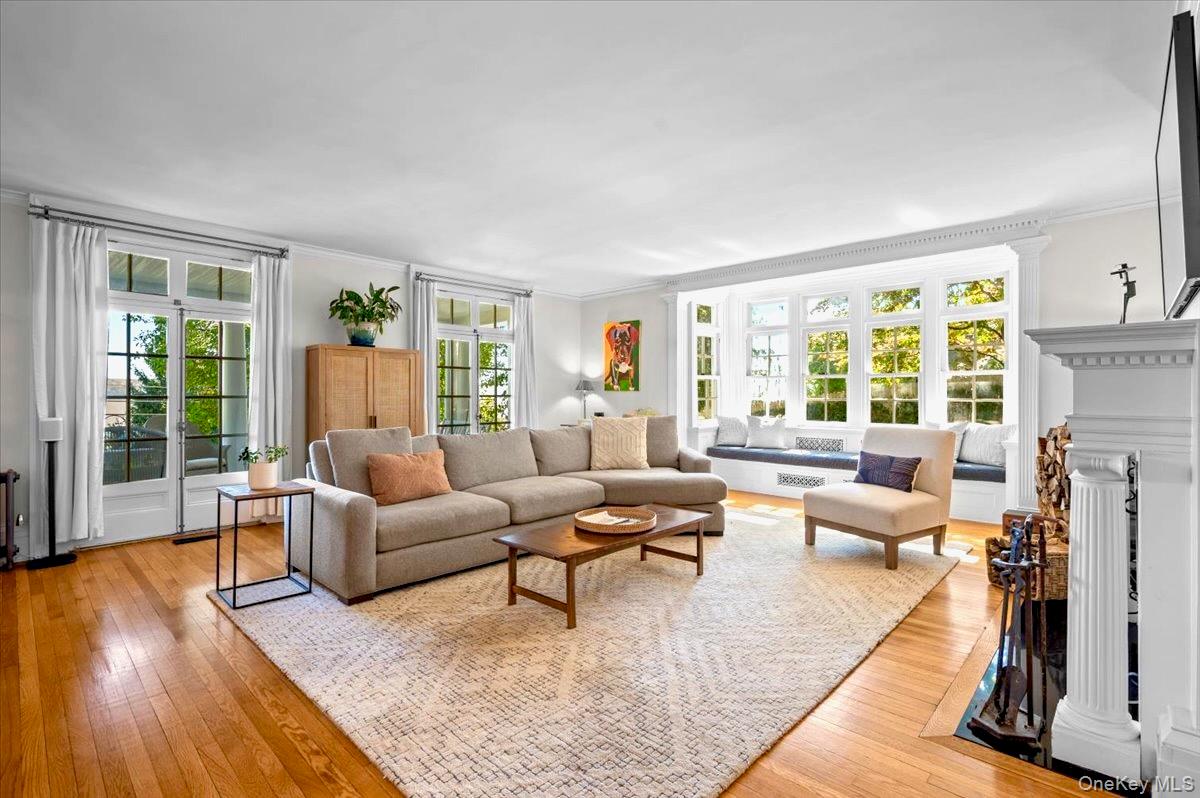 245 River Road Nyack, NY 10960 - Photo 6 of 45 a living room with furniture and a large window