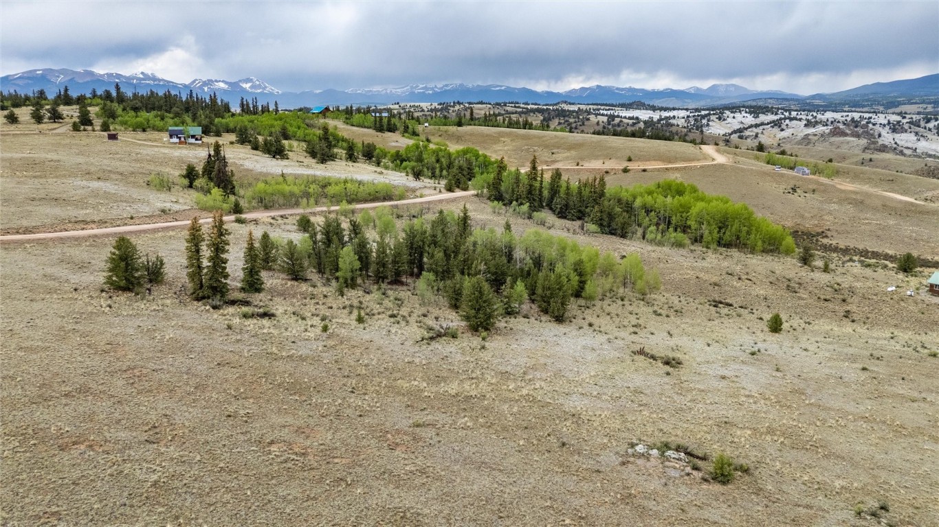 580 Arland Road Como, CO 80432 - Photo 12 of 28 a view of a lake with houses in the back