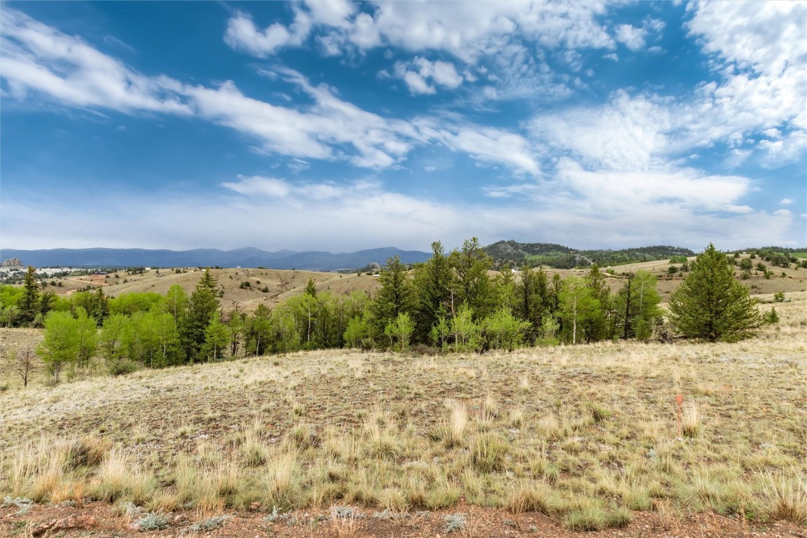 580 Arland Road Como, CO 80432 - Photo 19 of 28 a view of mountain with sunset