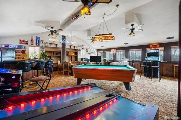 a view of a balcony with wooden floor