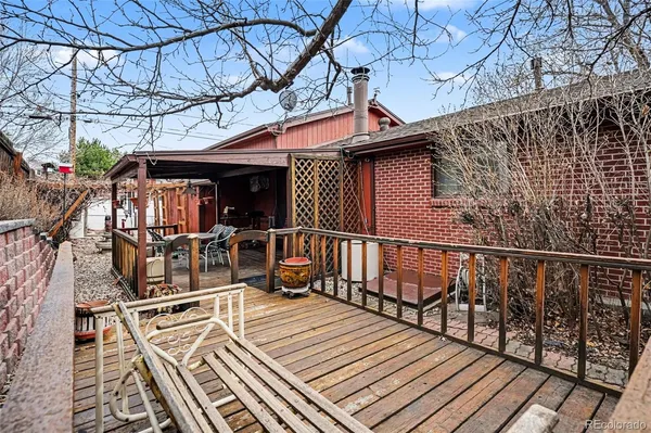 a view of a backyard of the house