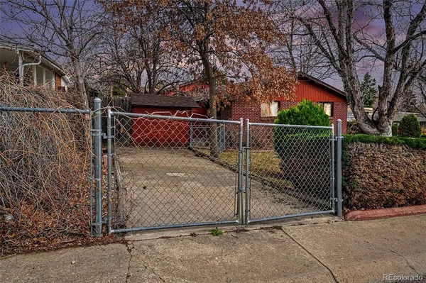 a room with a bed and furniture