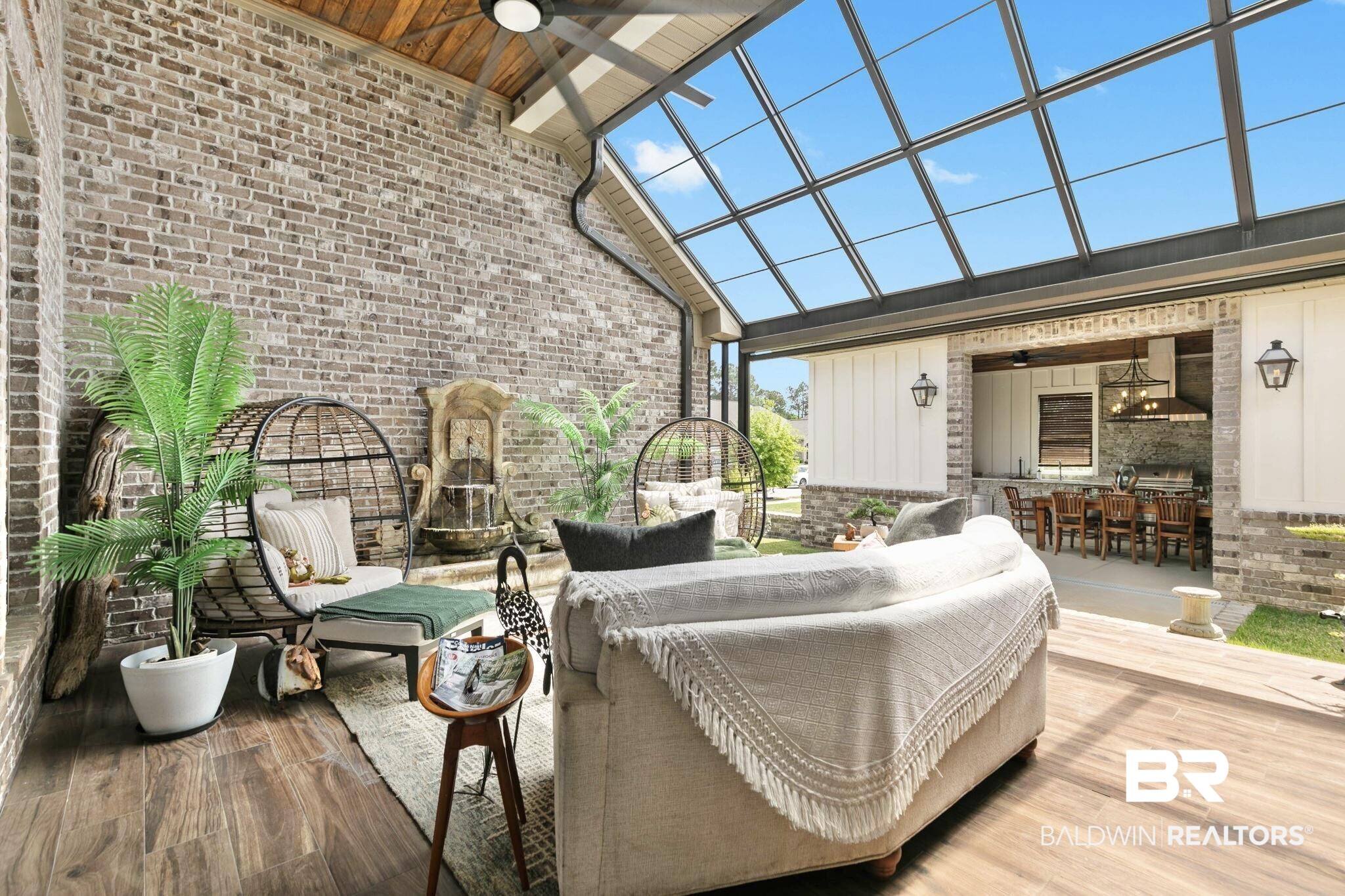 291 Hemlock Drive Fairhope, AL 36532 - Photo 47 of 65 Deck featuring a ceiling fan, a patio area, an outdoor lounge area with bar, and area for grilling