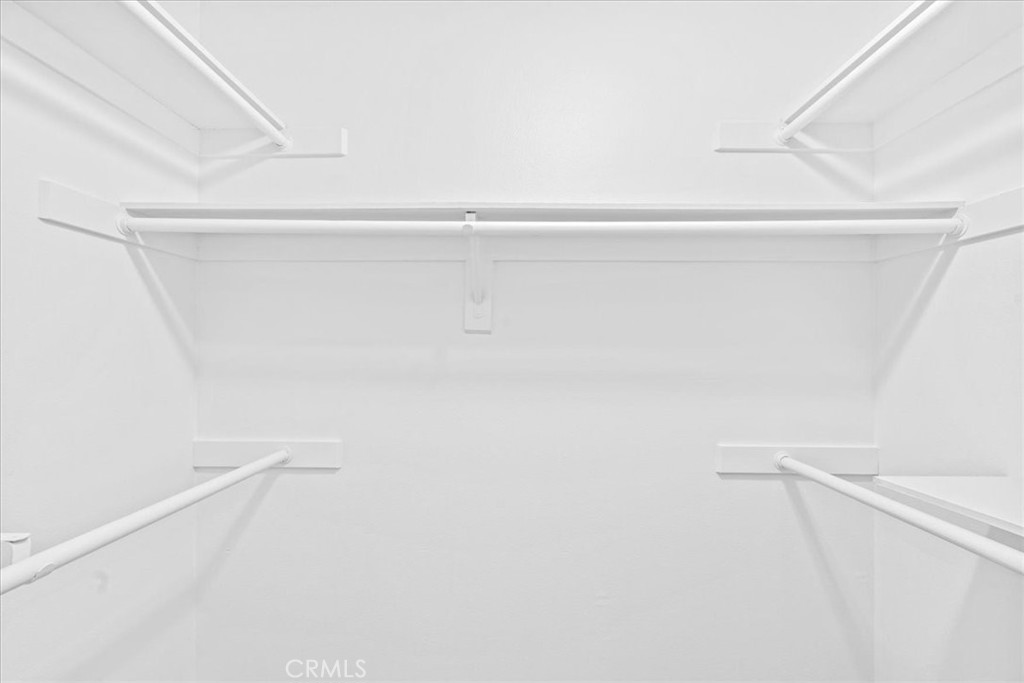 19 Softwind Aliso Viejo, CA 92656 - Photo 17 of 28 a view of a closet with racks on the wall