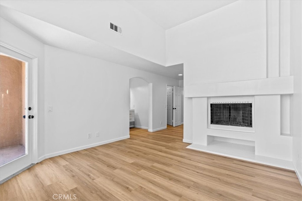 19 Softwind Aliso Viejo, CA 92656 - Photo 20 of 28 a view of an empty room with wooden floor and a window