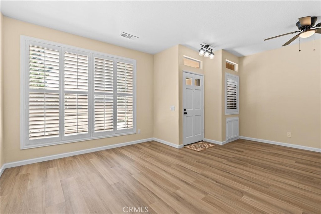 19 Softwind Aliso Viejo, CA 92656 - Photo 2 of 28 wooden floor in an empty room with a window