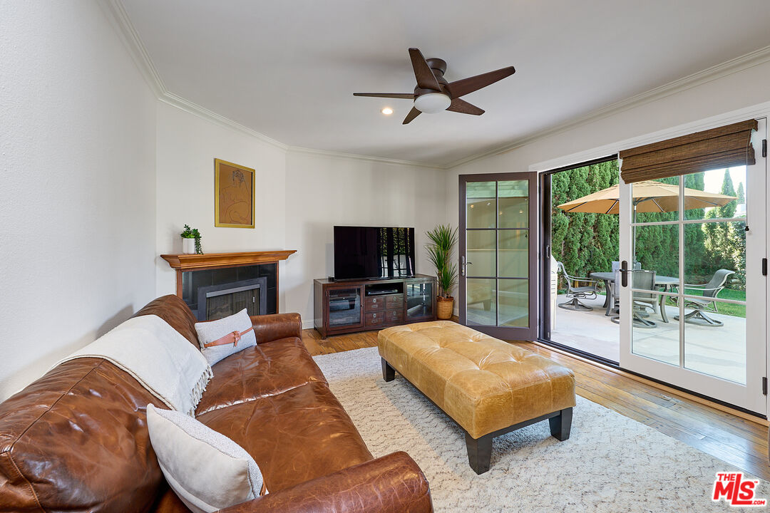 697 Washington Boulevard Marina del Rey, CA 90292 - Photo 13 of 23 a living room with furniture and a flat screen tv