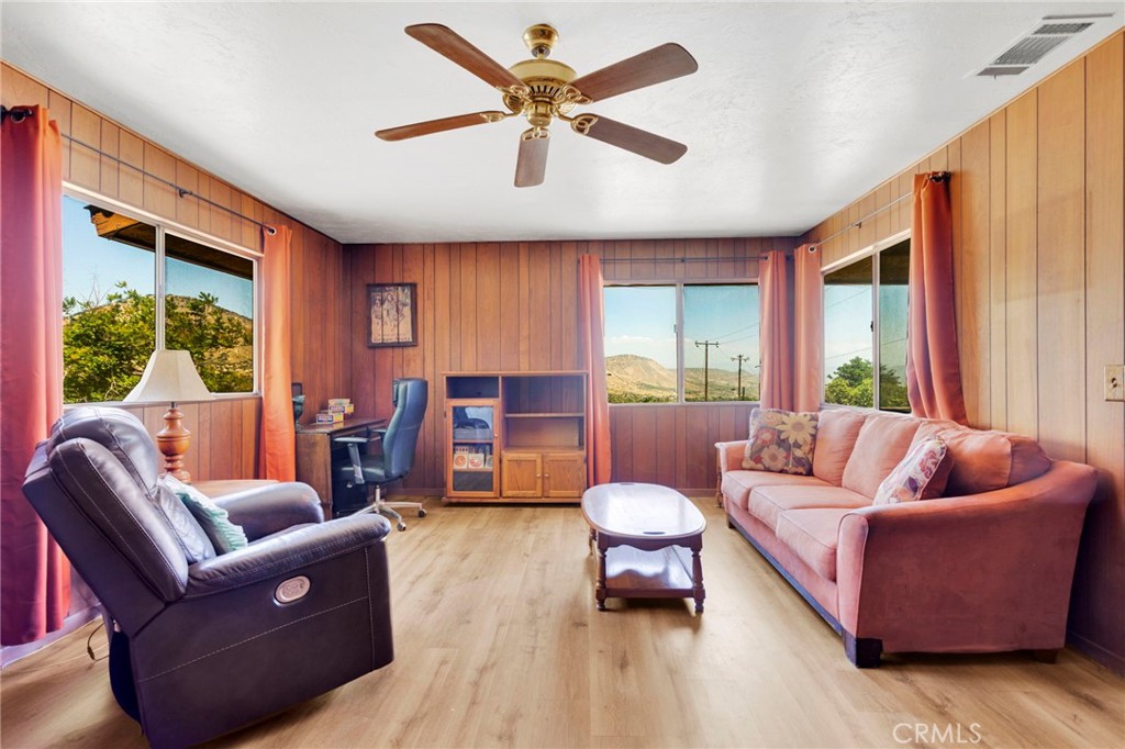 5500 Oil Well Road Phelan, CA 92371 - Photo 14 of 65 a living room with furniture and a large window