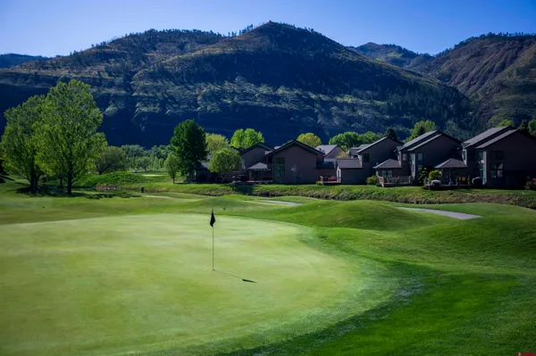 a house with garden in front of it