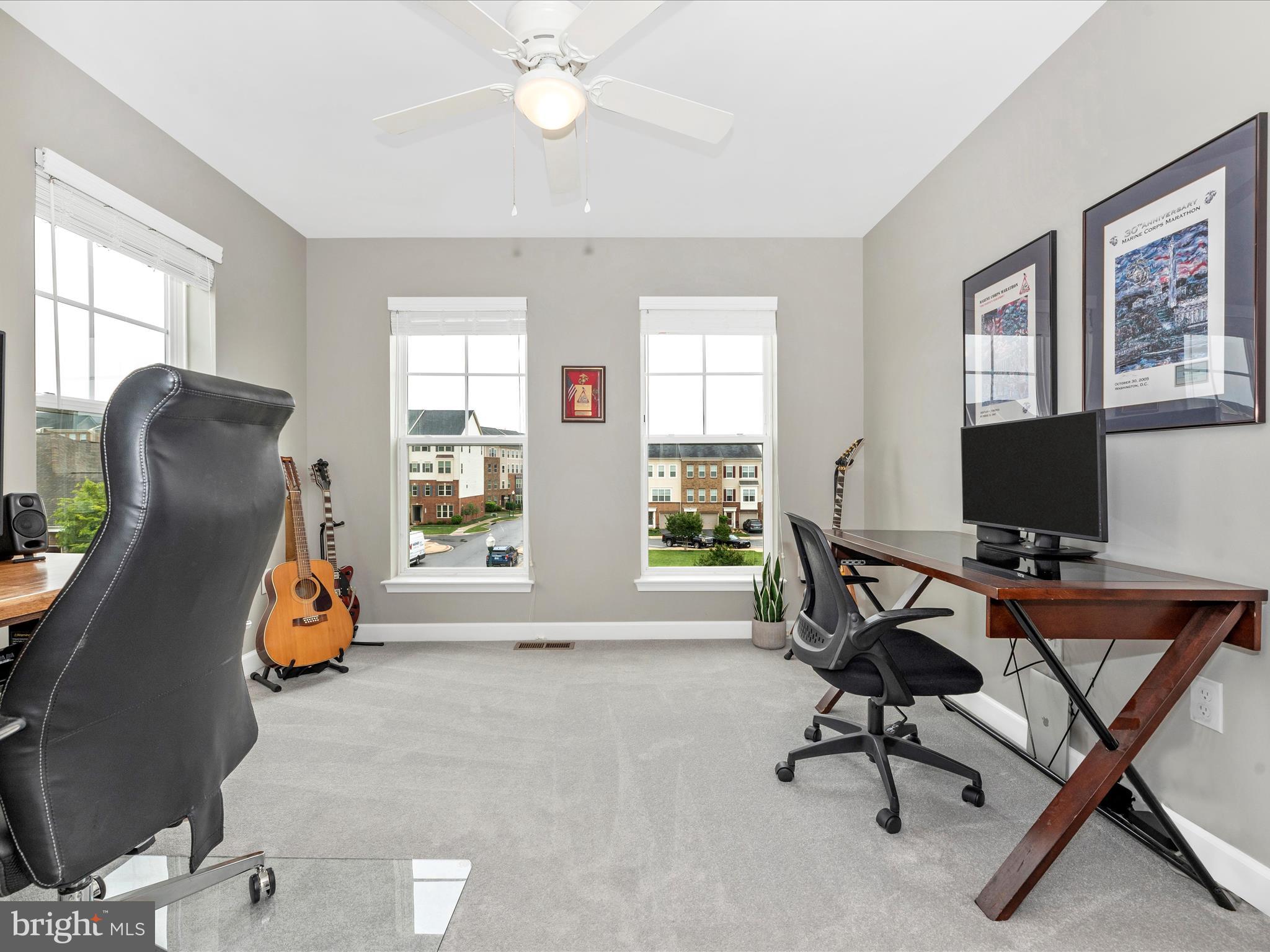 5920 Forum Square Frederick, MD 21703 - Photo 28 of 56 a view of a workspace with furniture and a window