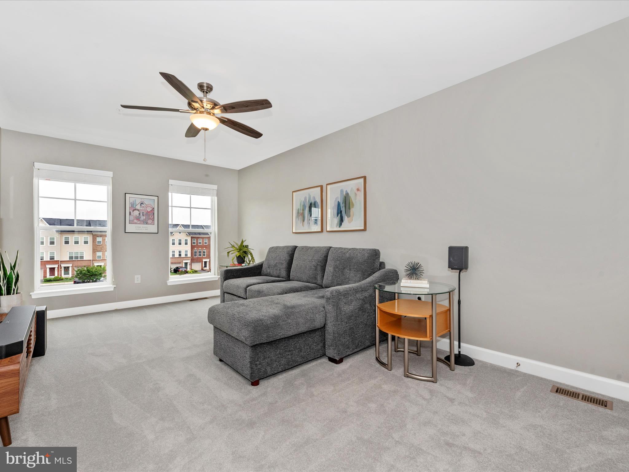 5920 Forum Square Frederick, MD 21703 - Photo 30 of 56 a living room with furniture and a window