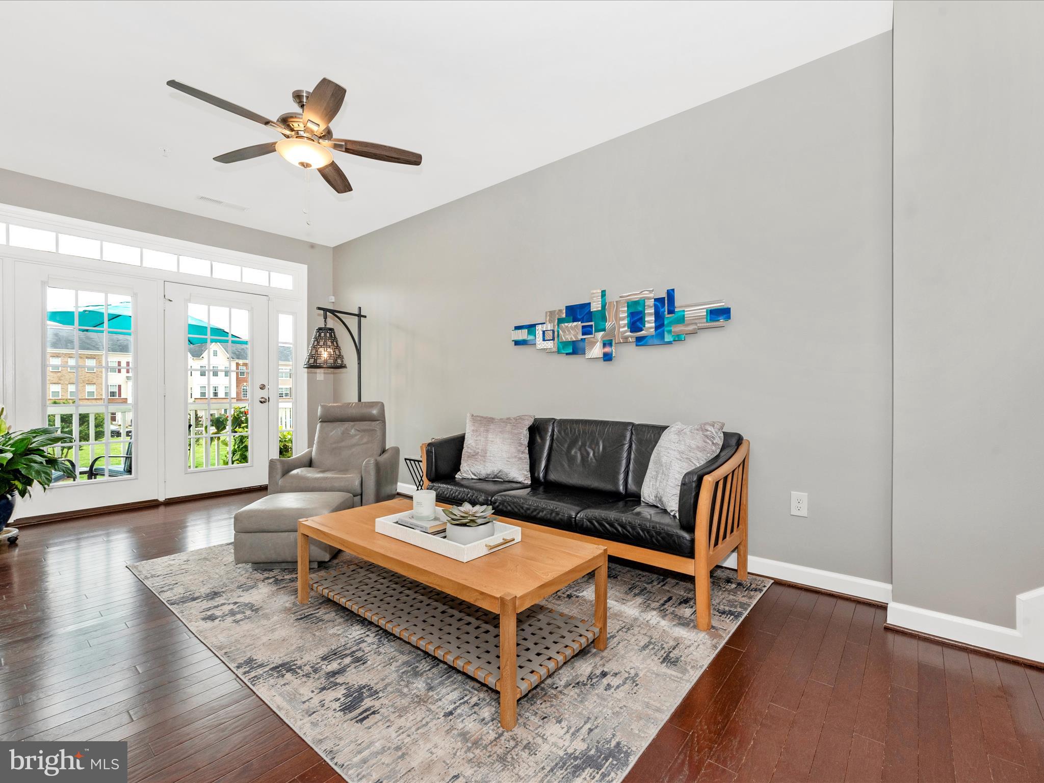 5920 Forum Square Frederick, MD 21703 - Photo 3 of 56 a living room with furniture and a wooden floor