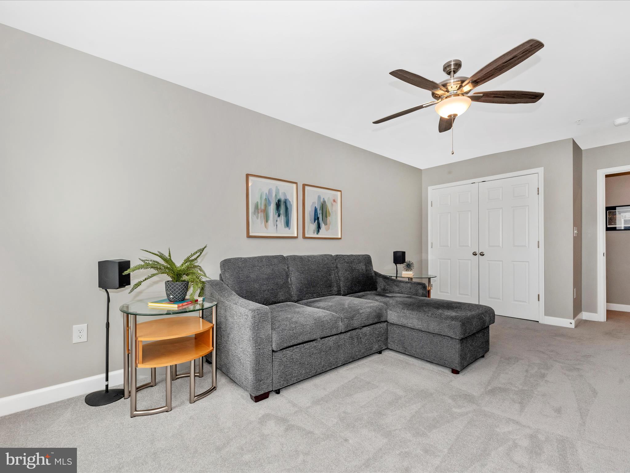 5920 Forum Square Frederick, MD 21703 - Photo 31 of 56 a living room with furniture and a ceiling fan