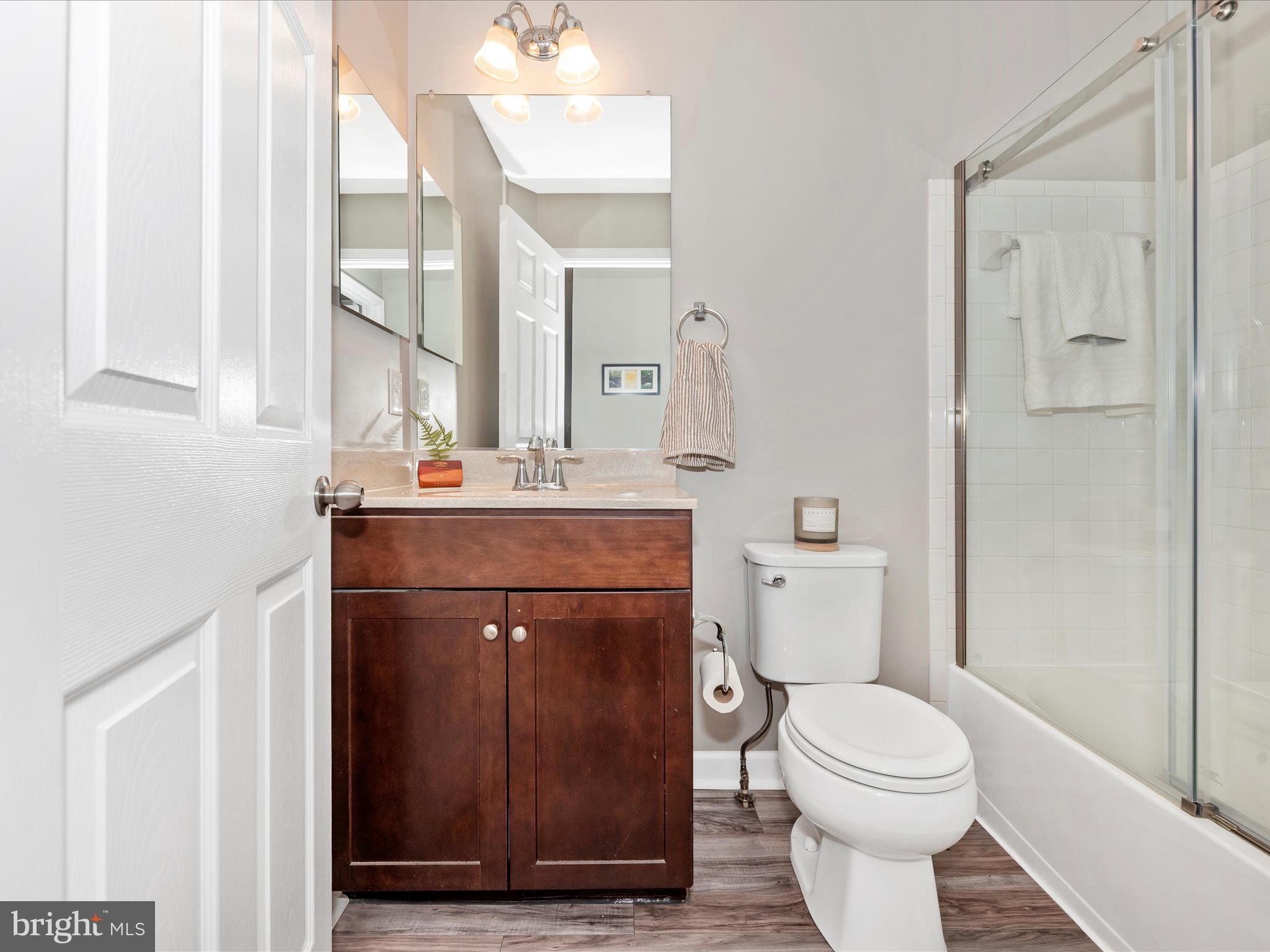 5920 Forum Square Frederick, MD 21703 - Photo 32 of 56 a bathroom with a sink a toilet and shower