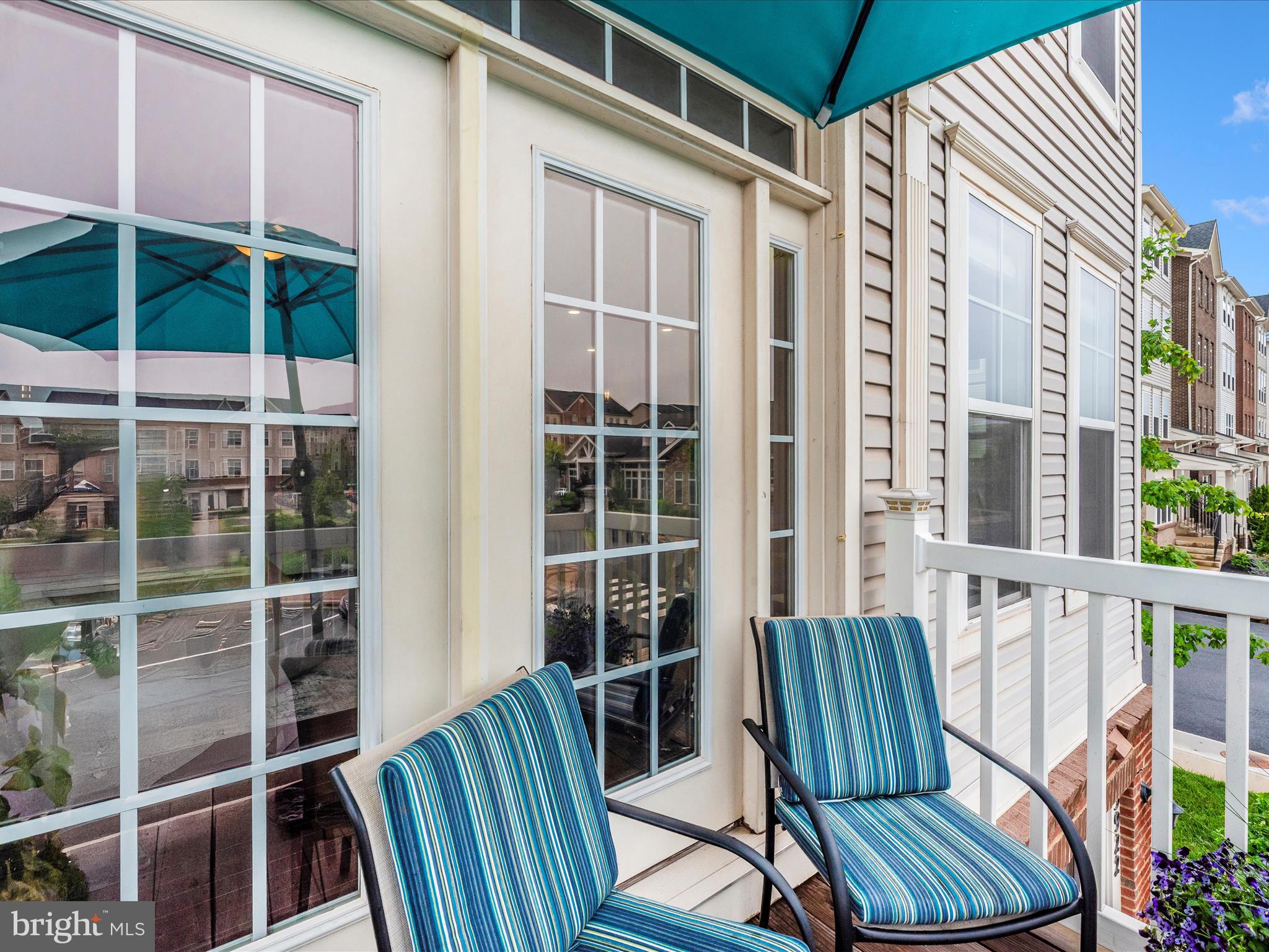 5920 Forum Square Frederick, MD 21703 - Photo 33 of 56 a view of balcony with wooden floor and seating space