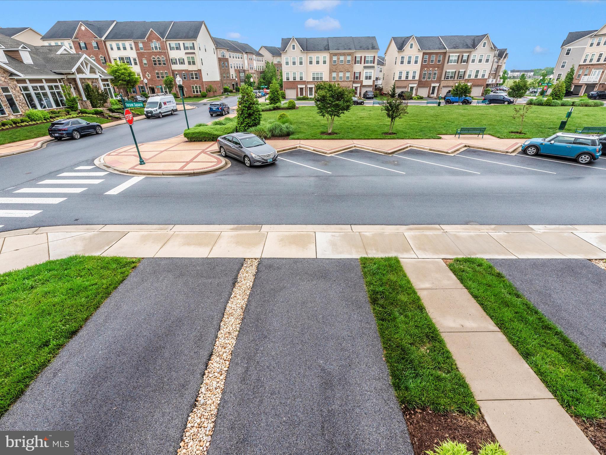 5920 Forum Square Frederick, MD 21703 - Photo 35 of 56 a view of a street with a cars park in front of it