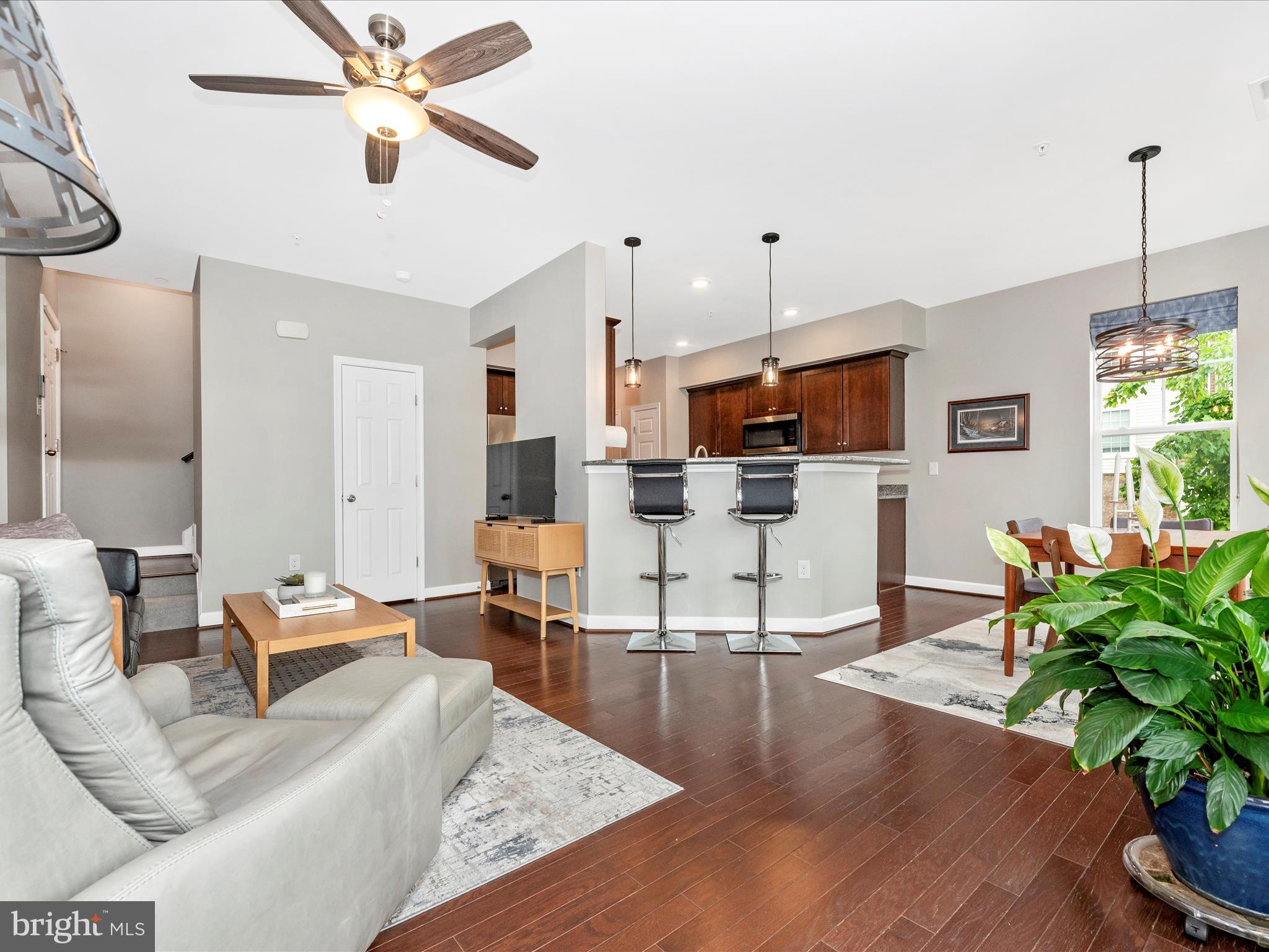 5920 Forum Square Frederick, MD 21703 - Photo 4 of 56 a living room with furniture and a large window