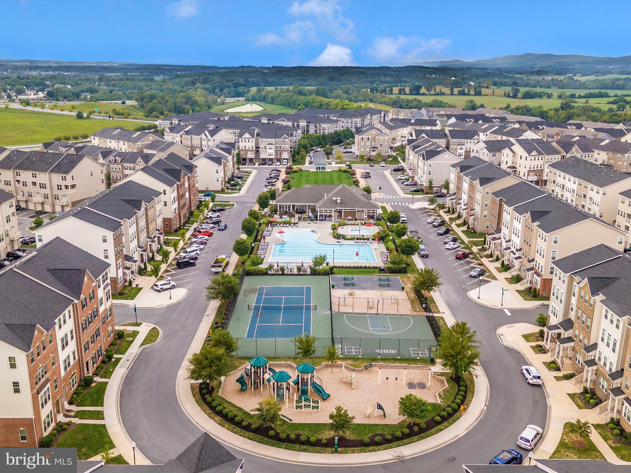 5920 Forum Square Frederick, MD 21703 - Photo 43 of 56 an aerial view of residential houses with outdoor space and ocean view
