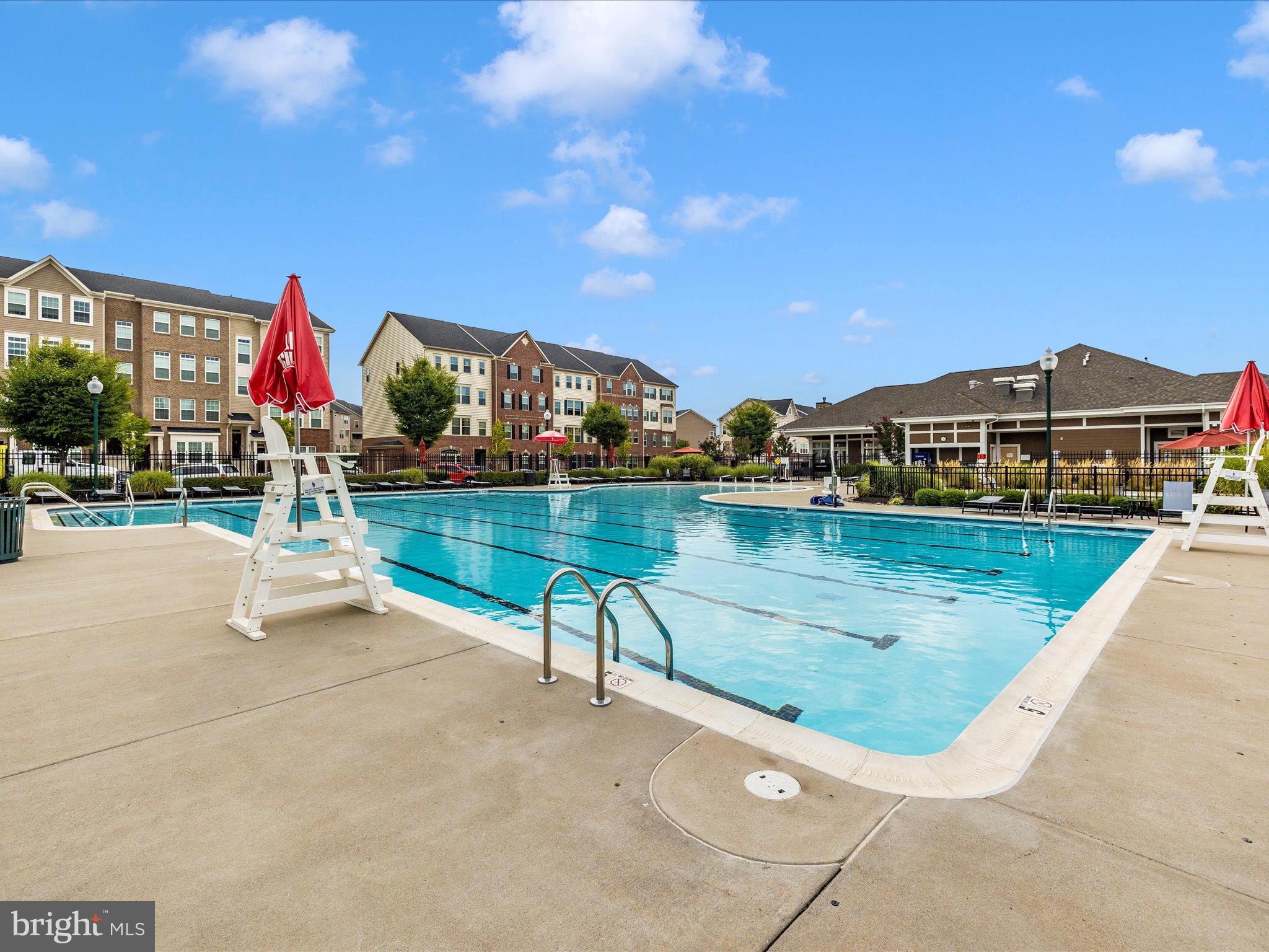 5920 Forum Square Frederick, MD 21703 - Photo 50 of 56 a view of swimming pool with a bench and lake view