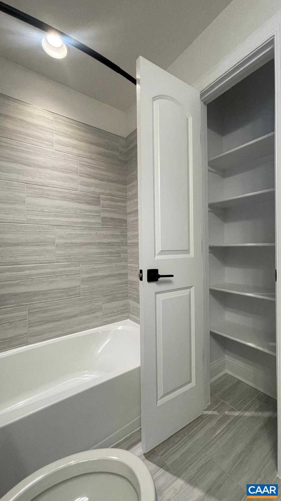 4006 Varick Street Charlottesville, VA 22901 - Photo 17 of 33 a bathroom with a bathtub and a shower
