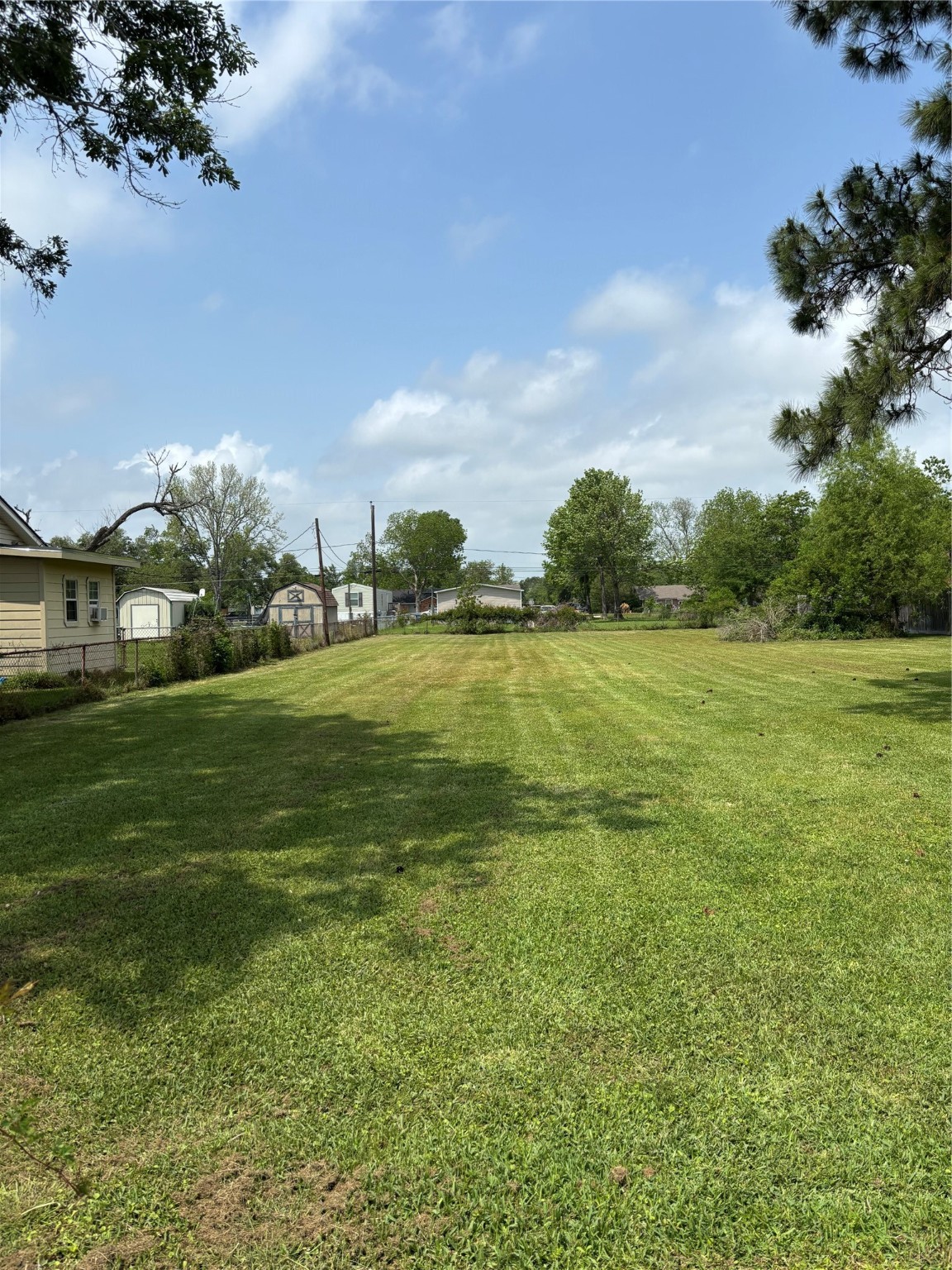2501 Barbers Hill Road Highlands, TX 77562 - Photo 3 of 7 a view of a field with an ocean