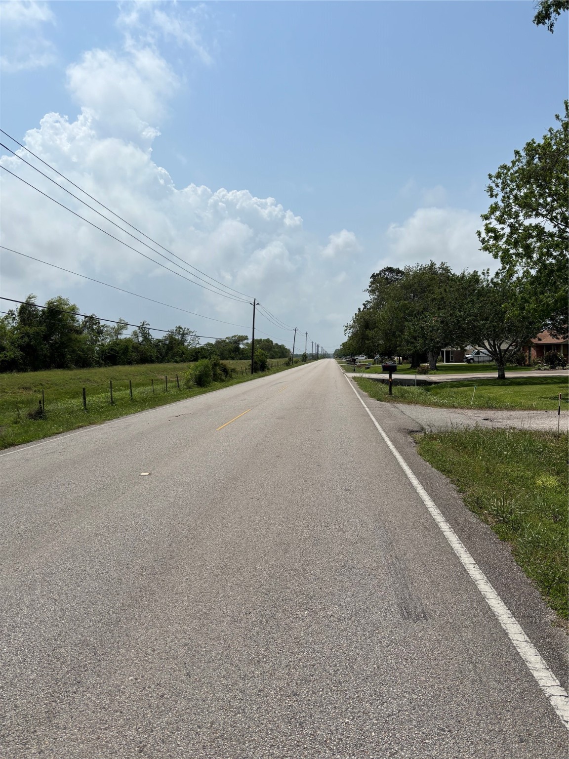 2501 Barbers Hill Road Highlands, TX 77562 - Photo 6 of 7 a view of a golf course with a road