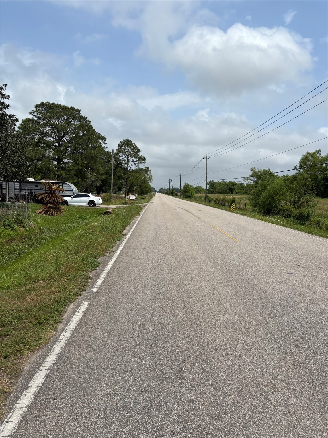 2501 Barbers Hill Road Highlands, TX 77562 - Photo 7 of 7 a view of a street with a building in the background