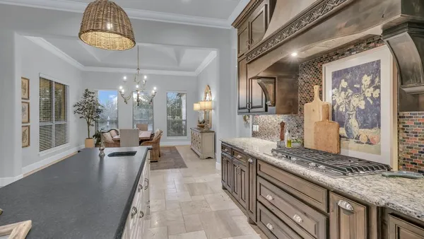 a view of a kitchen and dining room