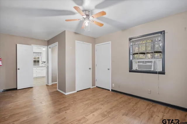 a view of an empty room with a window