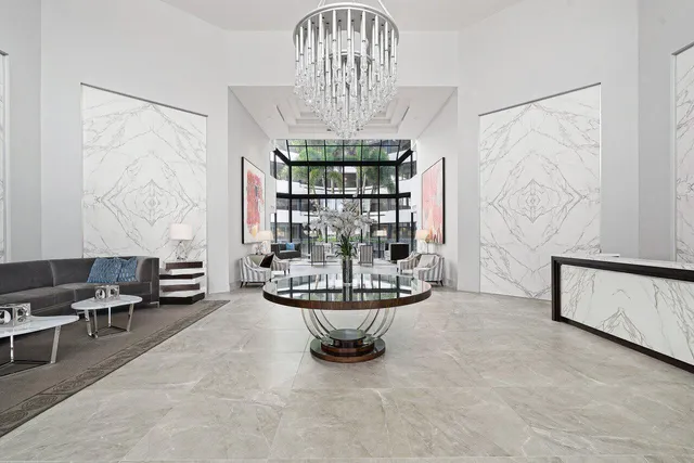 a view of a livingroom with furniture and window