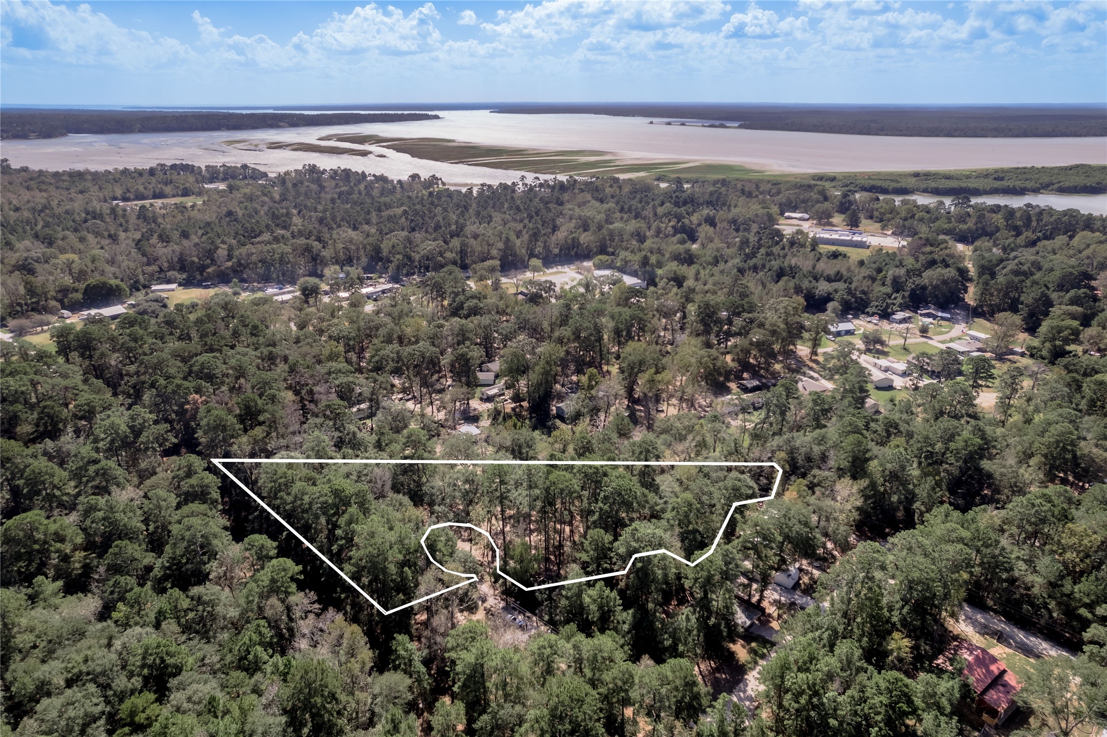 525 Canadian Drive Trinity, TX 75862 - Photo 2 of 36 an aerial view of a house with a yard