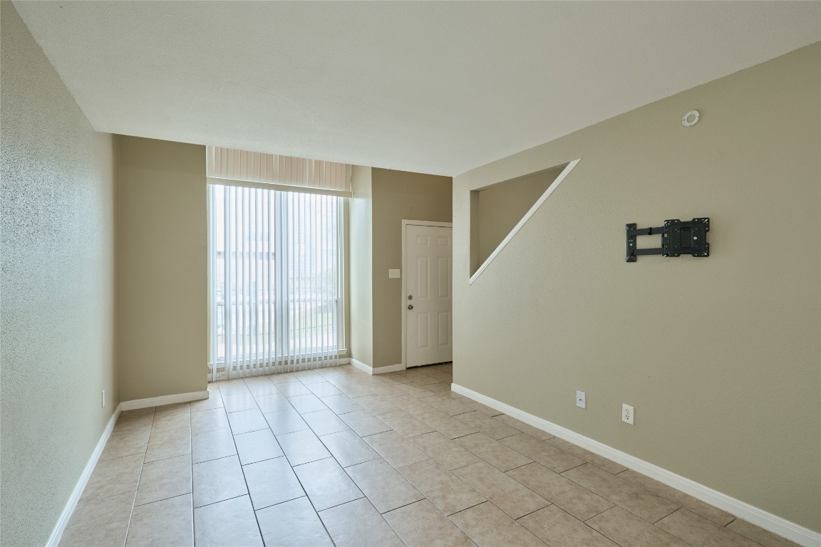 16120 Stuebner Airline Road, Unit 212 Spring, TX 77379 - Photo 21 of 29 a view of an empty room with a window