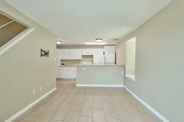 a view of a kitchen with a sink