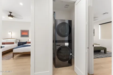 a view of a livingroom with washer and dryer