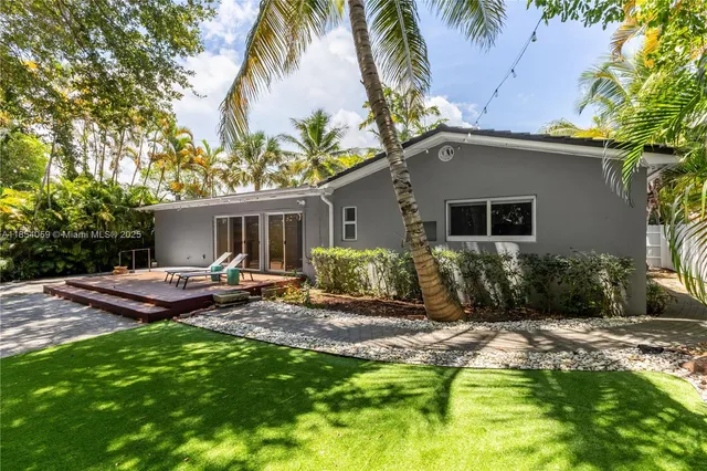 a view of swimming pool with an outdoor space and seating area