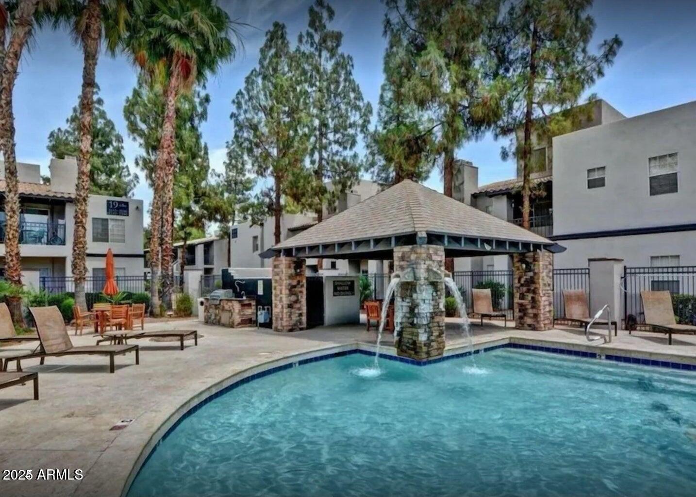 14145 North 92nd Street, Unit 2101 Scottsdale, AZ 85260 - Photo 30 of 30 a view of a park with bench and trees