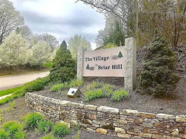 a sign on the side of a road