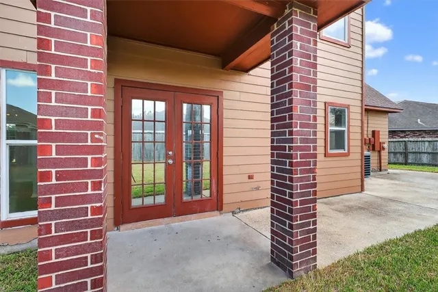 a view of a brick building with many windows