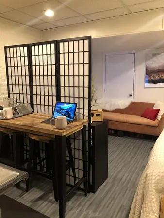 a kitchen that has a sink and a stove
