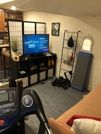 a view of workspace with furniture and window