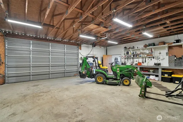 a view of a garage with parked cars