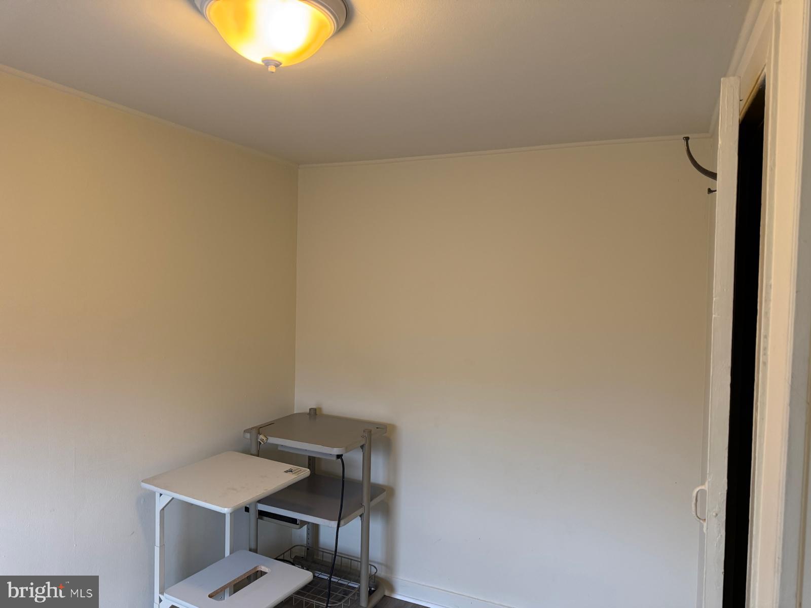 230 West Lafayette Avenue, Unit 3 Baltimore, MD 21217 - Photo 19 of 19 a bathroom with a sink and a mirror