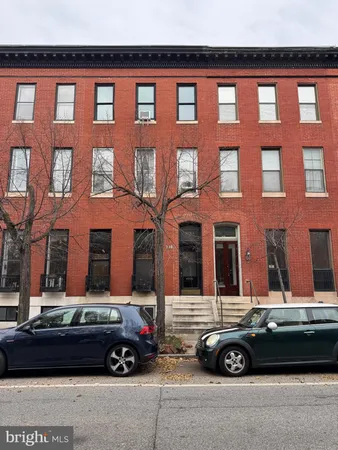 a car parked in front of a building