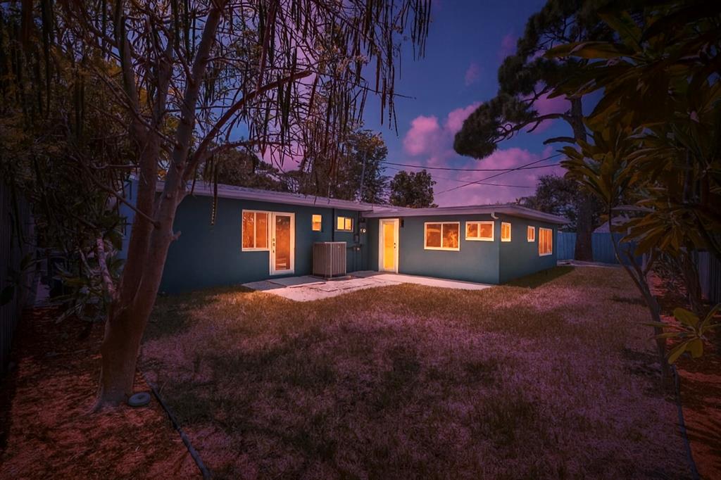 121 Southeast 8th Street Pompano Beach, FL 33060 - Photo 12 of 14 a view of a building with a yard