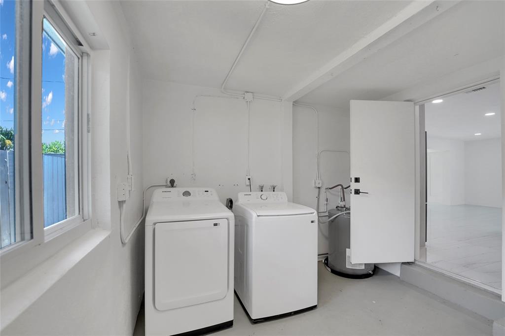 121 Southeast 8th Street Pompano Beach, FL 33060 - Photo 10 of 14 a utility room with dryer and washer