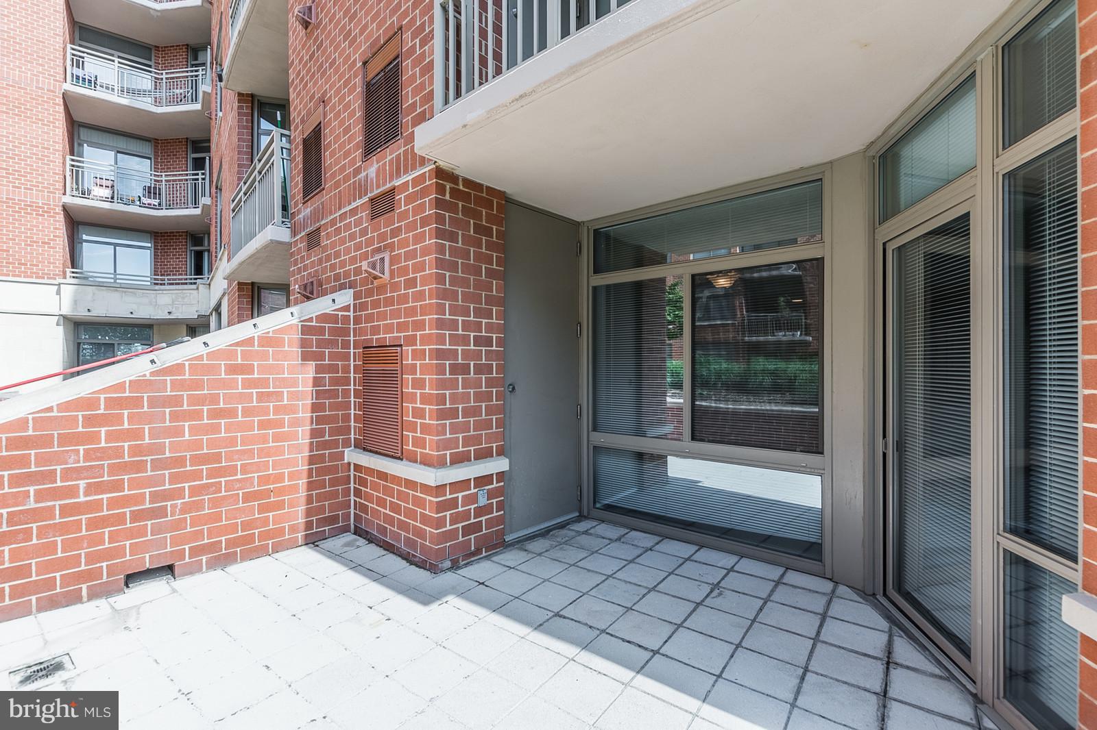3600 South Glebe Road, Unit 227W Arlington, VA 22202 - Photo 20 of 29 a view of a brick buildings with entryway